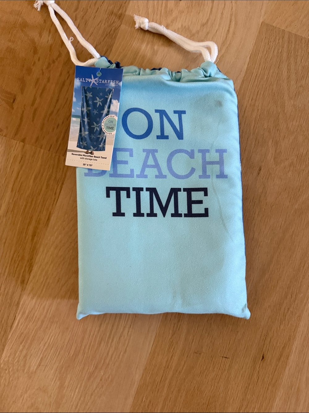 Blue Starfish Drawstring Pouch with beach towel